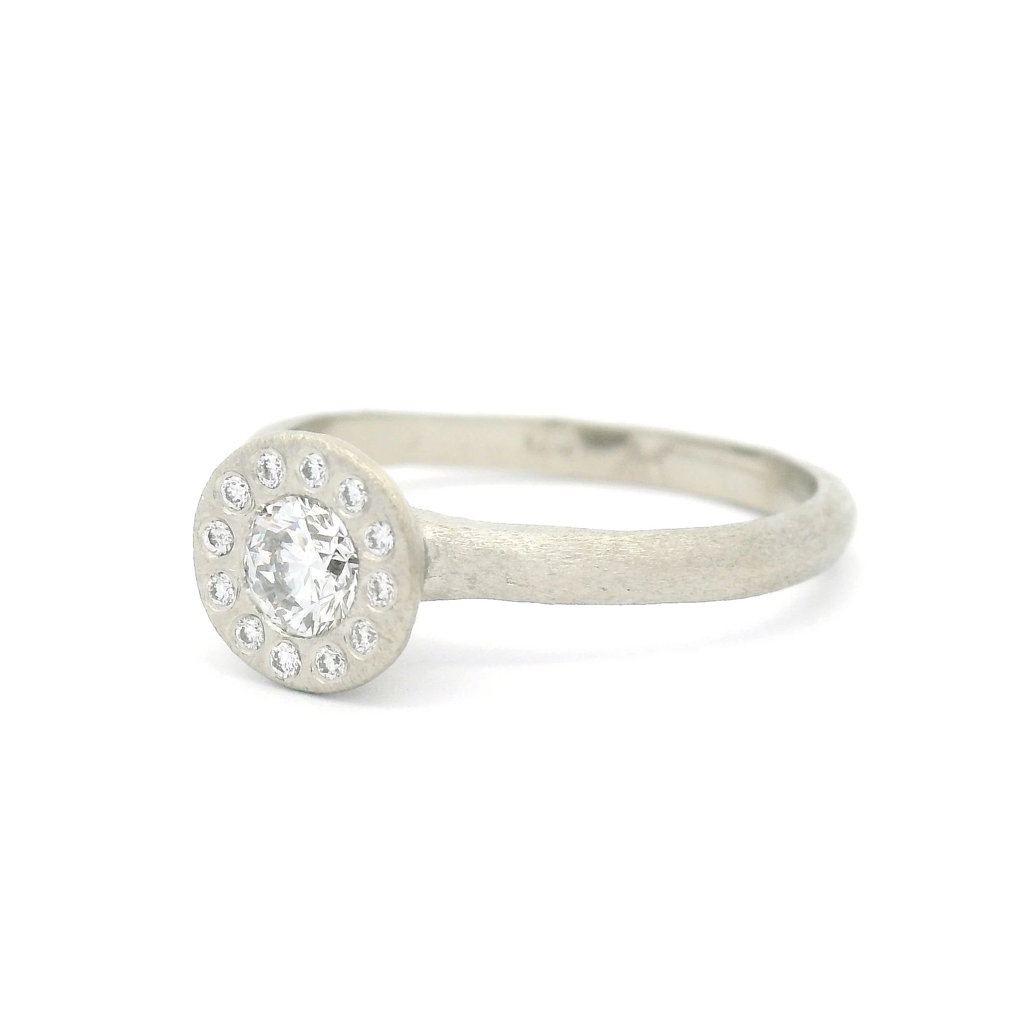 14k White Textured Engagement Ring with 0.26ct Diamond and Accent Diamond Halo - Image 2