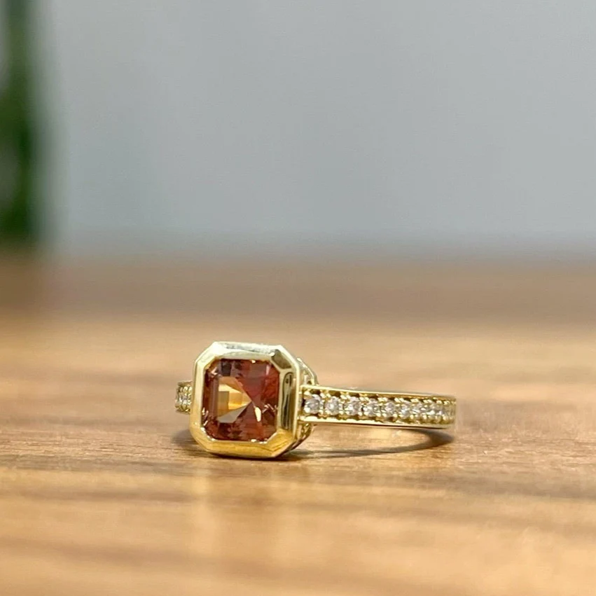 18k Yellow Bezel Set Ring with 0.86ct Orange Sapphire and Accent Diamonds - Image 3
