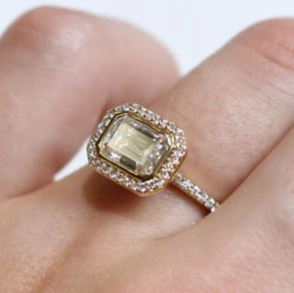 14k Yellow Moissanite Emerald Cut East-West Halo Engagement Ring - Image 3