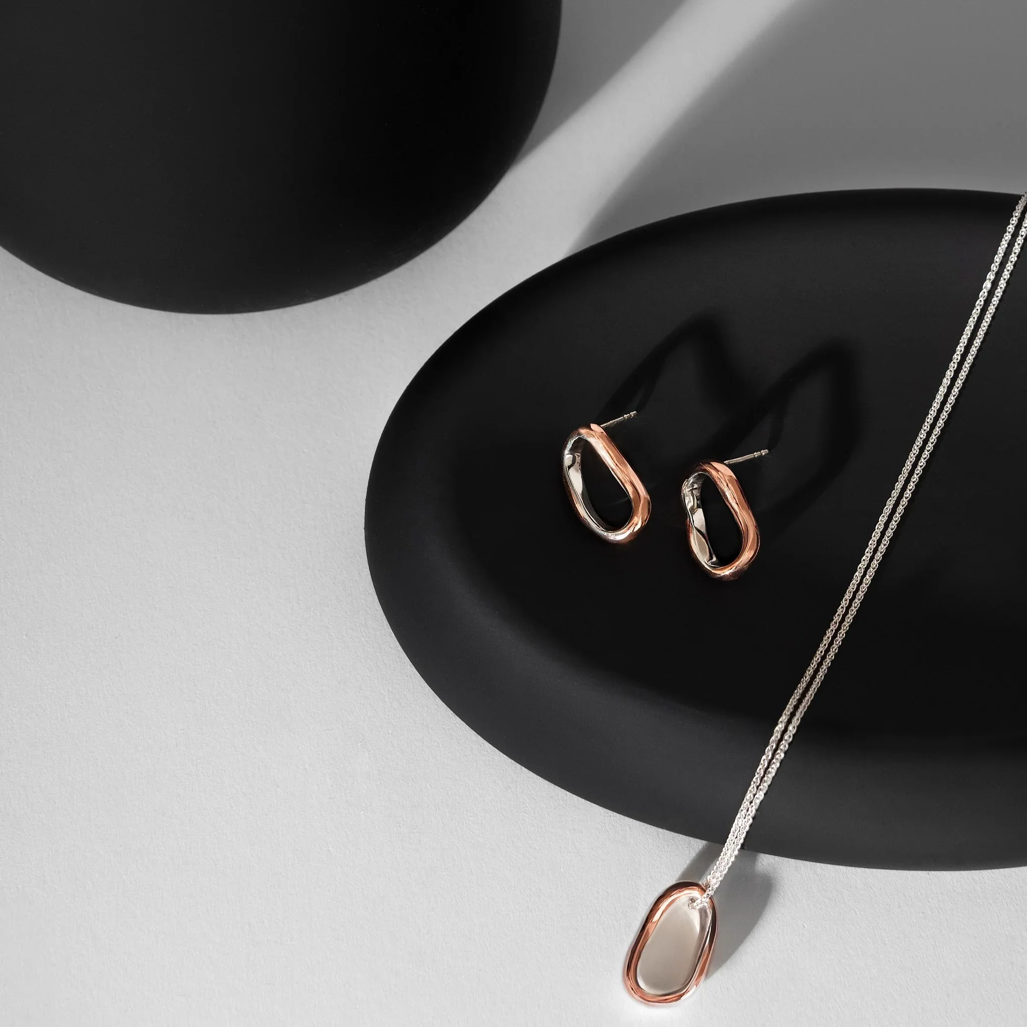 Silver and Copper Curve Loop Earrings - Image 2